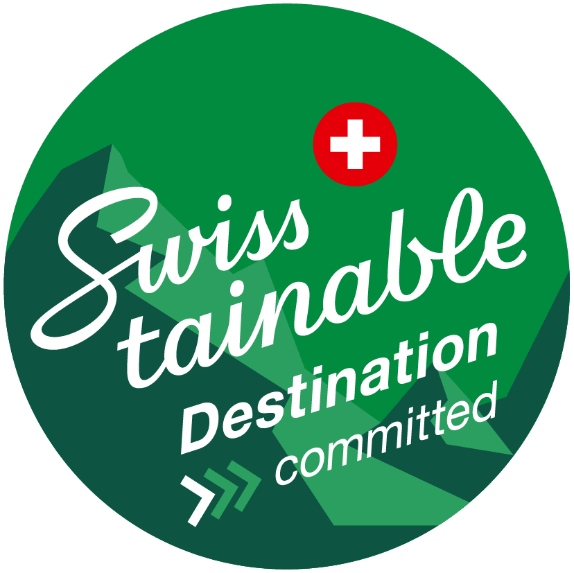 Logo Swisstainable Destination "committed"