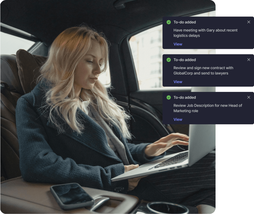 Woman working on a laptop in a car as Success.co "To-do added" notifications appear, showing offline access