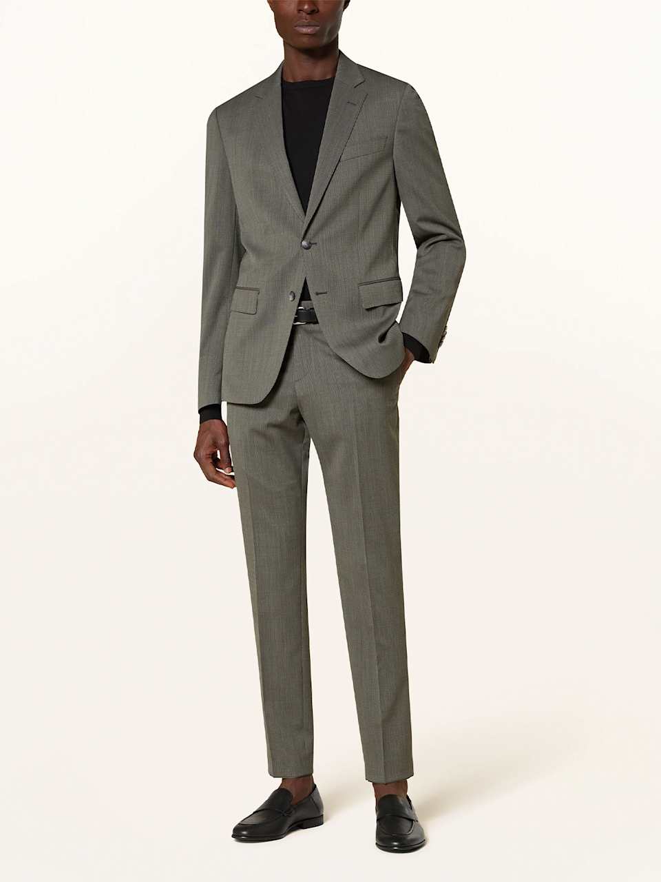 Mann trägt einen grünen Slim-Fit-Anzug