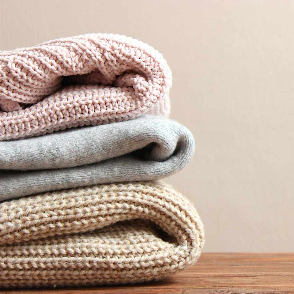 „Pullover-Stapel – Beispiel für Wollwaschgang