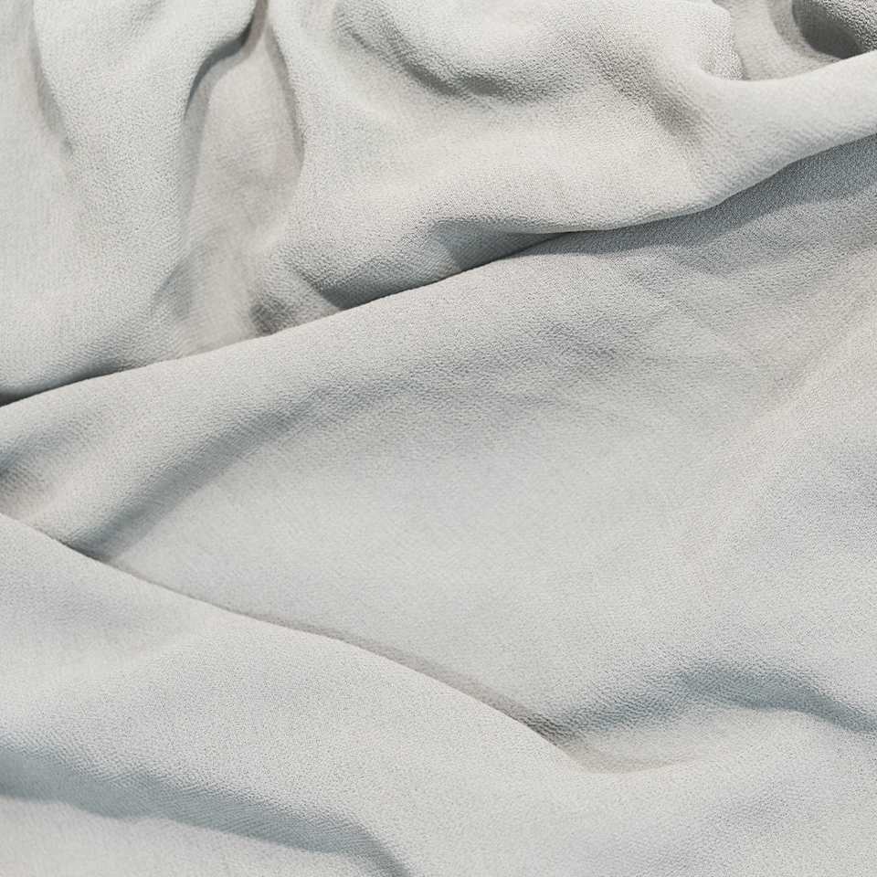 Nahaufnahme von einem hellgrauen Viskose-Stoff