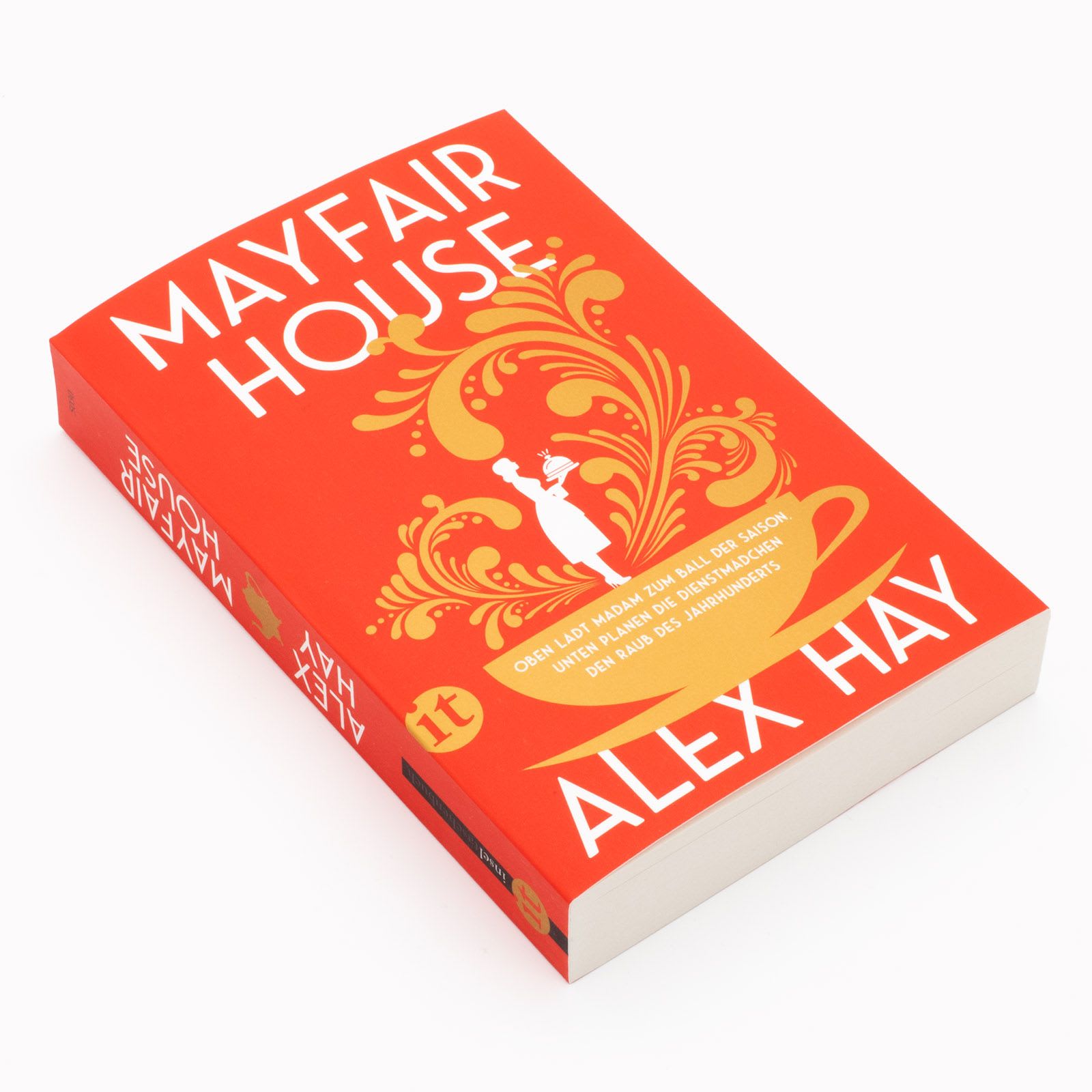 das Taschenbuch »Mayfair House« von Alex Hay im Liegen