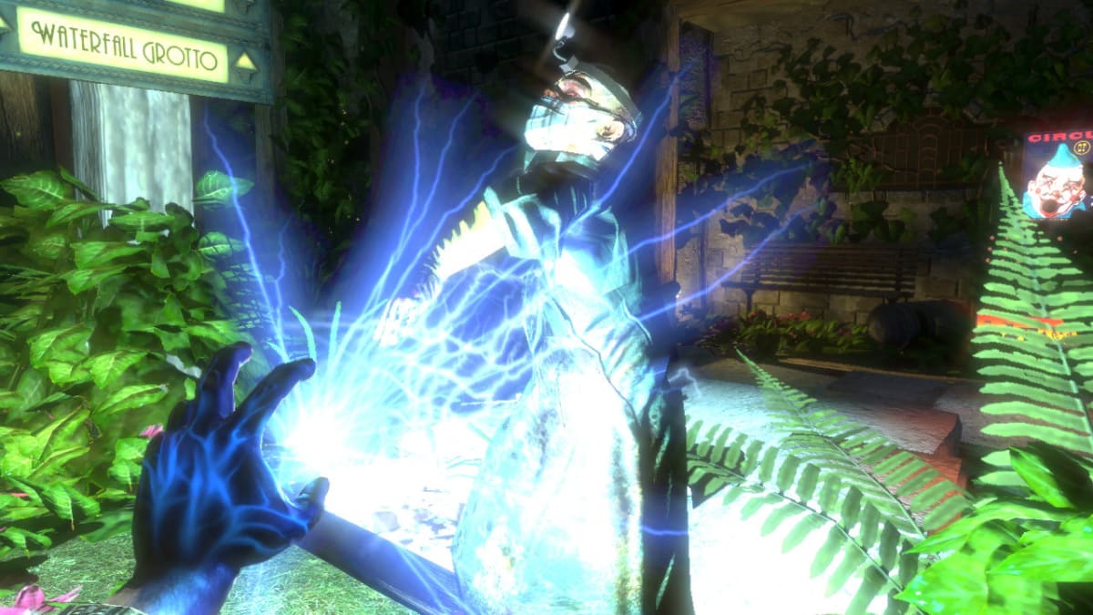 Electricity arcs from the player’s hand toward an enemy in BioShock’s Waterfall Grotto.