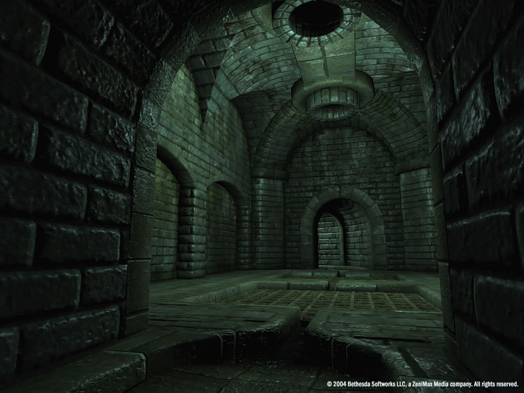 Green-lit stone arches and a circular floor pattern inside an Ayleid ruin in the original Oblivion.