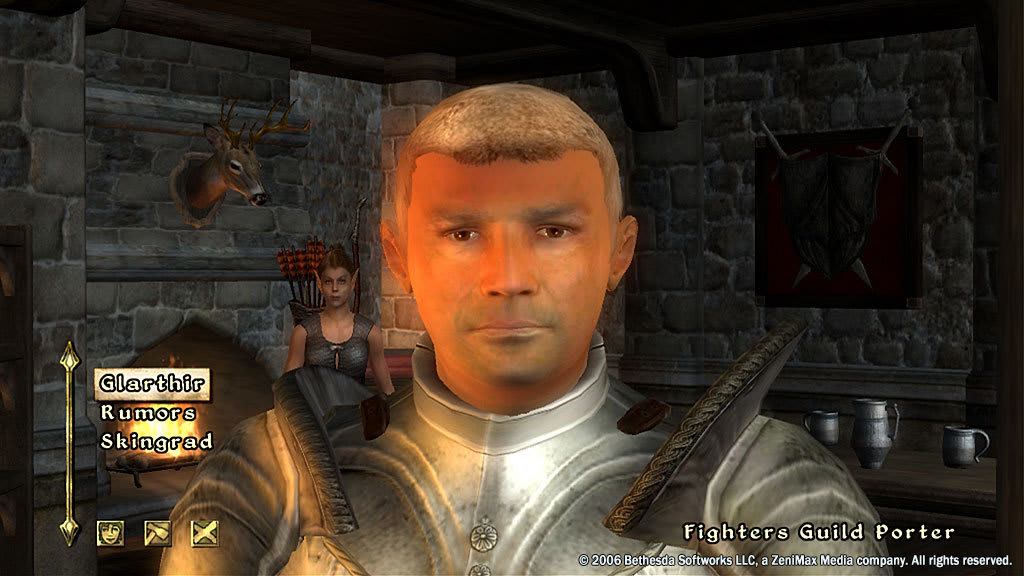 The original Oblivion dialogue interface shows a Fighters Guild Porter and selectable conversation topics.