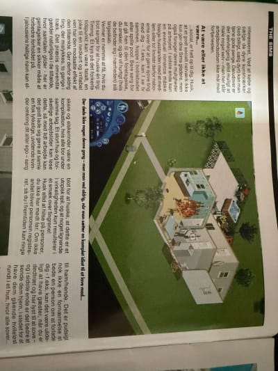 Original magazine screenshot of a Sims kitchen on fire beside advice about relationships.