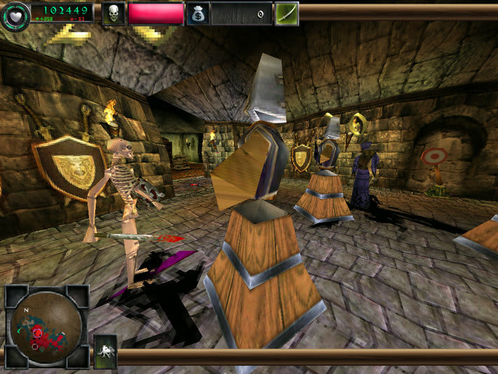 First-person Dungeon Keeper II gameplay inside a training room, with a skeleton and training targets ahead.