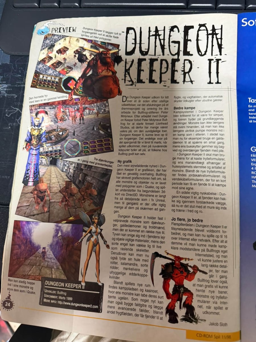Photograph of the Dungeon Keeper II preview on page 24 of CD-ROM Spil 11/1998.