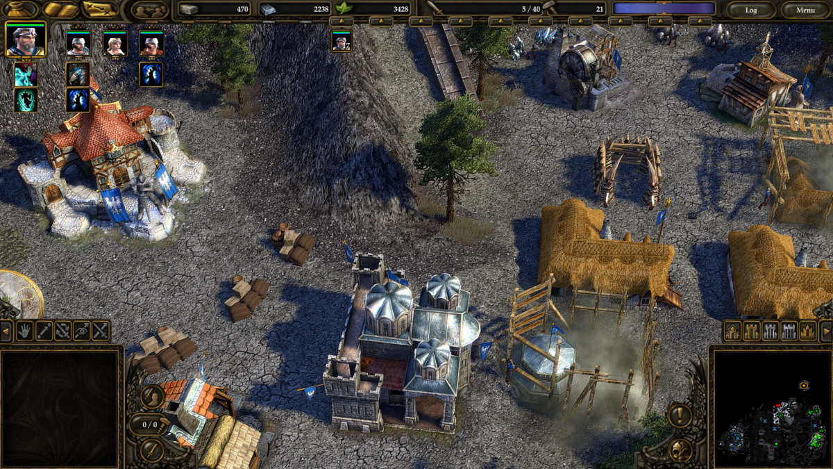 SpellForce 2 interface with hero portraits, resource counters and a fantasy base