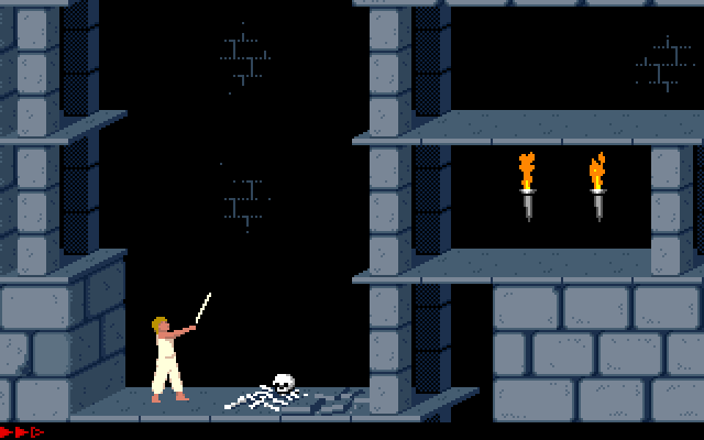 The original DOS Prince of Persia in the first level, holding the sword beside a skeleton