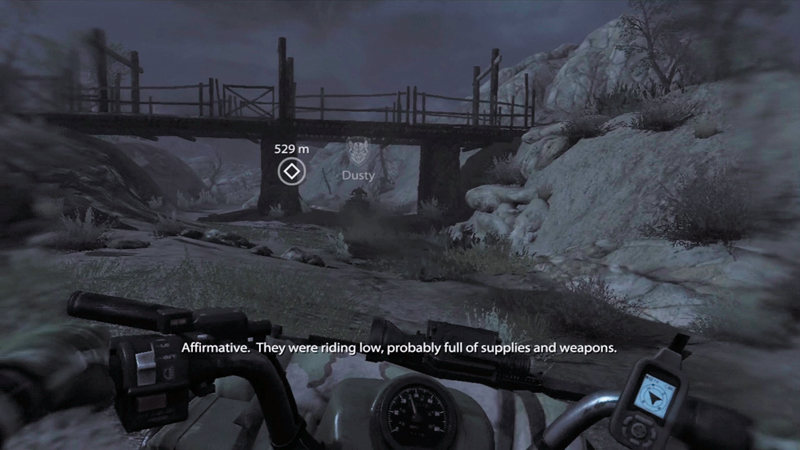 The ATV handlebar GPS, a Dusty label and an objective-distance marker appear during the night ride.