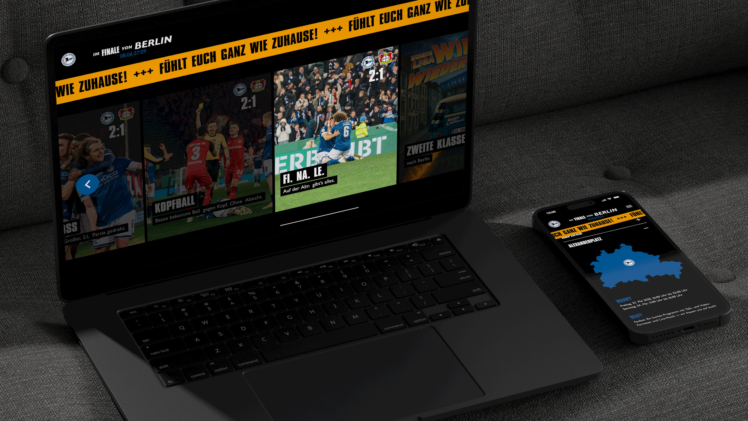 Auf einem Monitor und einem Smartphone ist die Landingpage für das Pokalfinale von Arminina Bielefeld in Berlin dargestellt