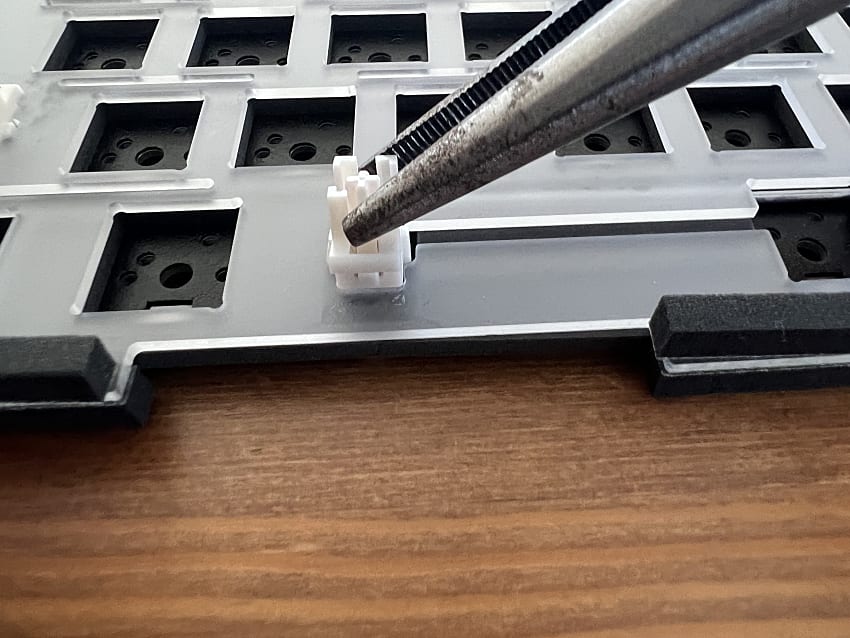 once the clips were pressed, I carefully pulled the stabilisers out from the plate