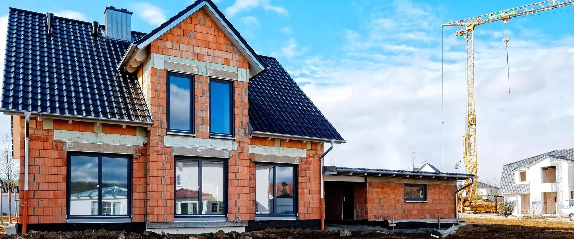 Baustelle mit Einfamilienhaus