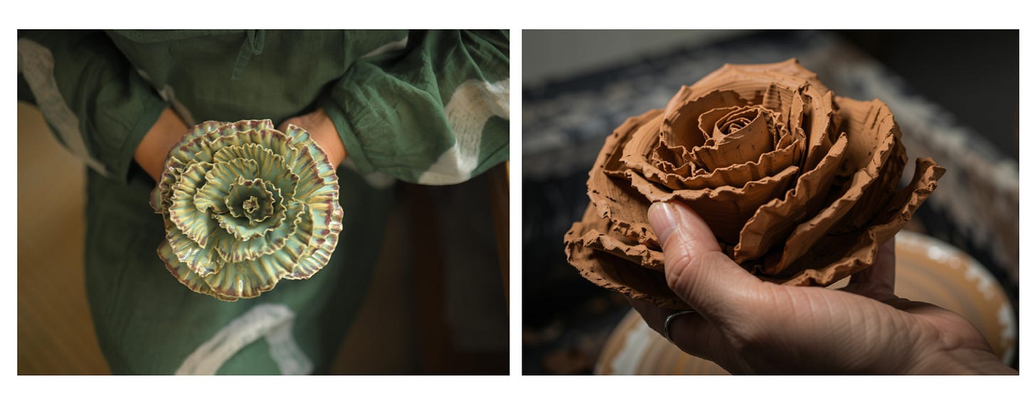 A side-by-side ceramic art collage by Bangalore artist Sheetal: the left image shows a hand holding an unfired, raw terracotta clay rose in progress; the right image shows hands holding a finished, glazed green-and-burgundy ceramic flower sculpture.