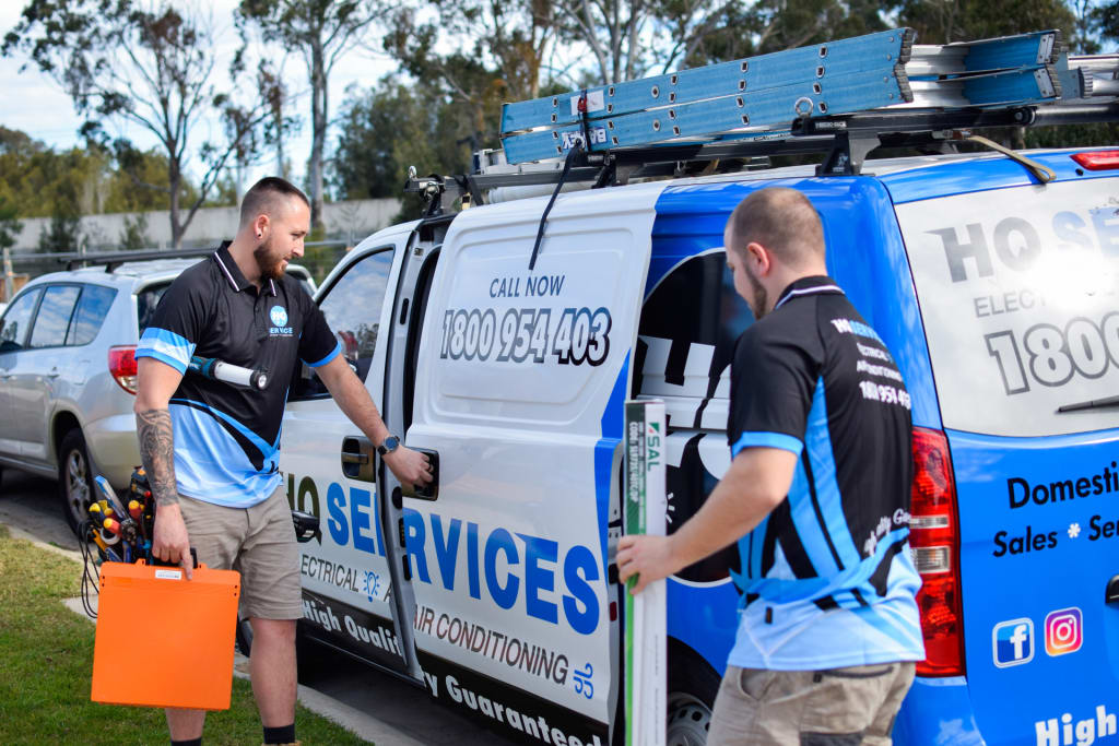 HQ Technicians Visiting Residential Property