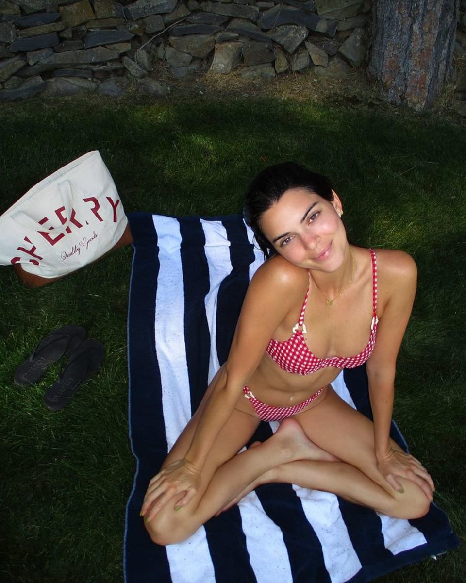 Photo of Kendall Jenner wearing a red and whit bikini by Fruity Booty