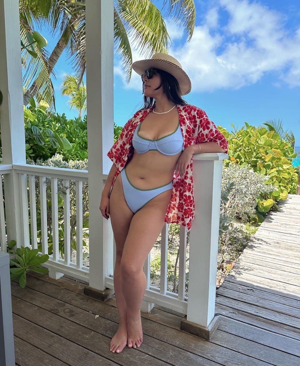 Alessandra Gracia wearing a sky-blue bikini by Ookioh