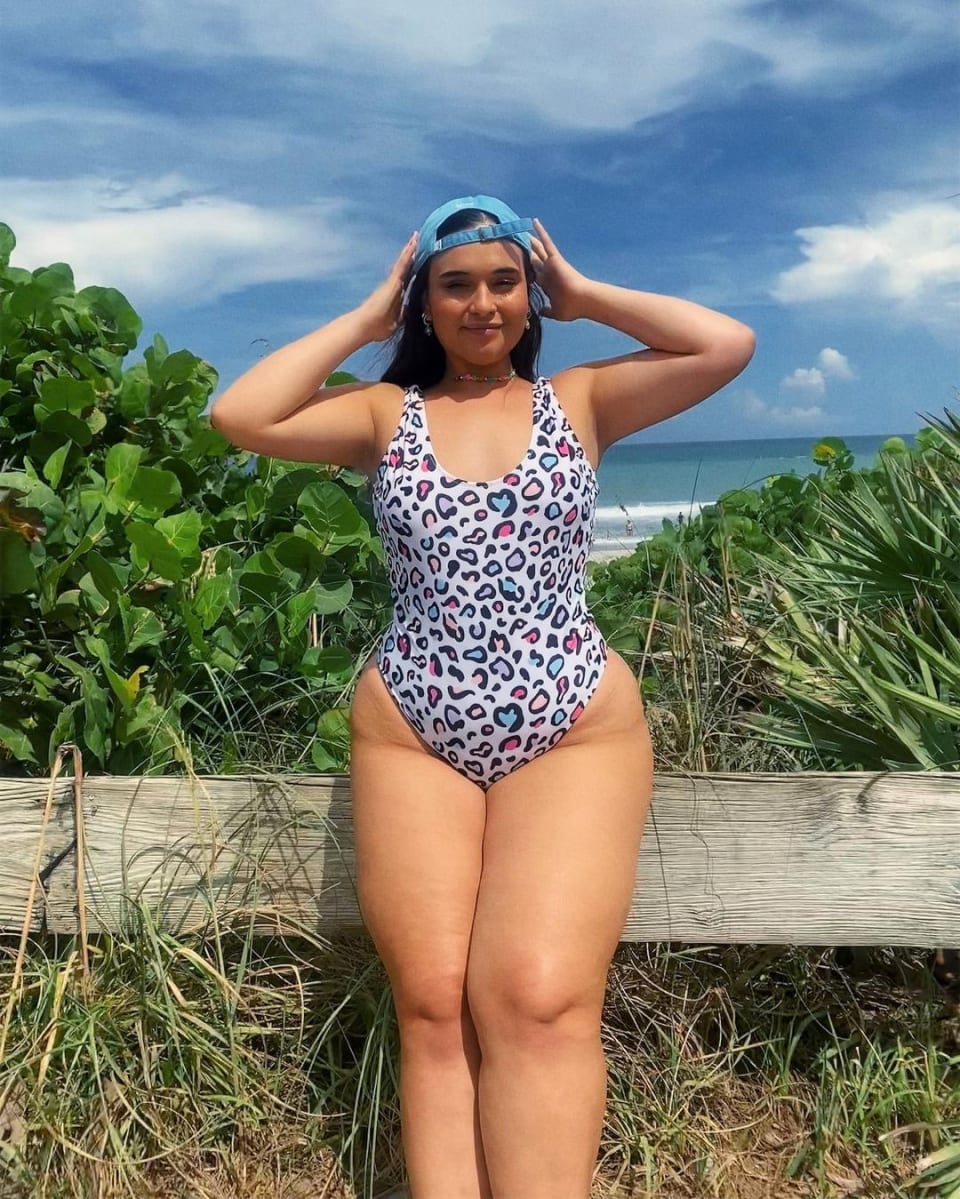 Beary Becca wearing floral printed swimsuit