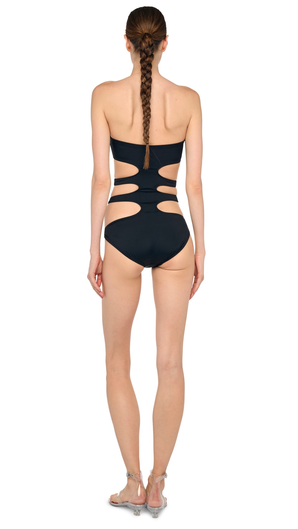 Norma Kamali Triple E Mio in black, three-quarter view of the strapless bandeau top edge, studio