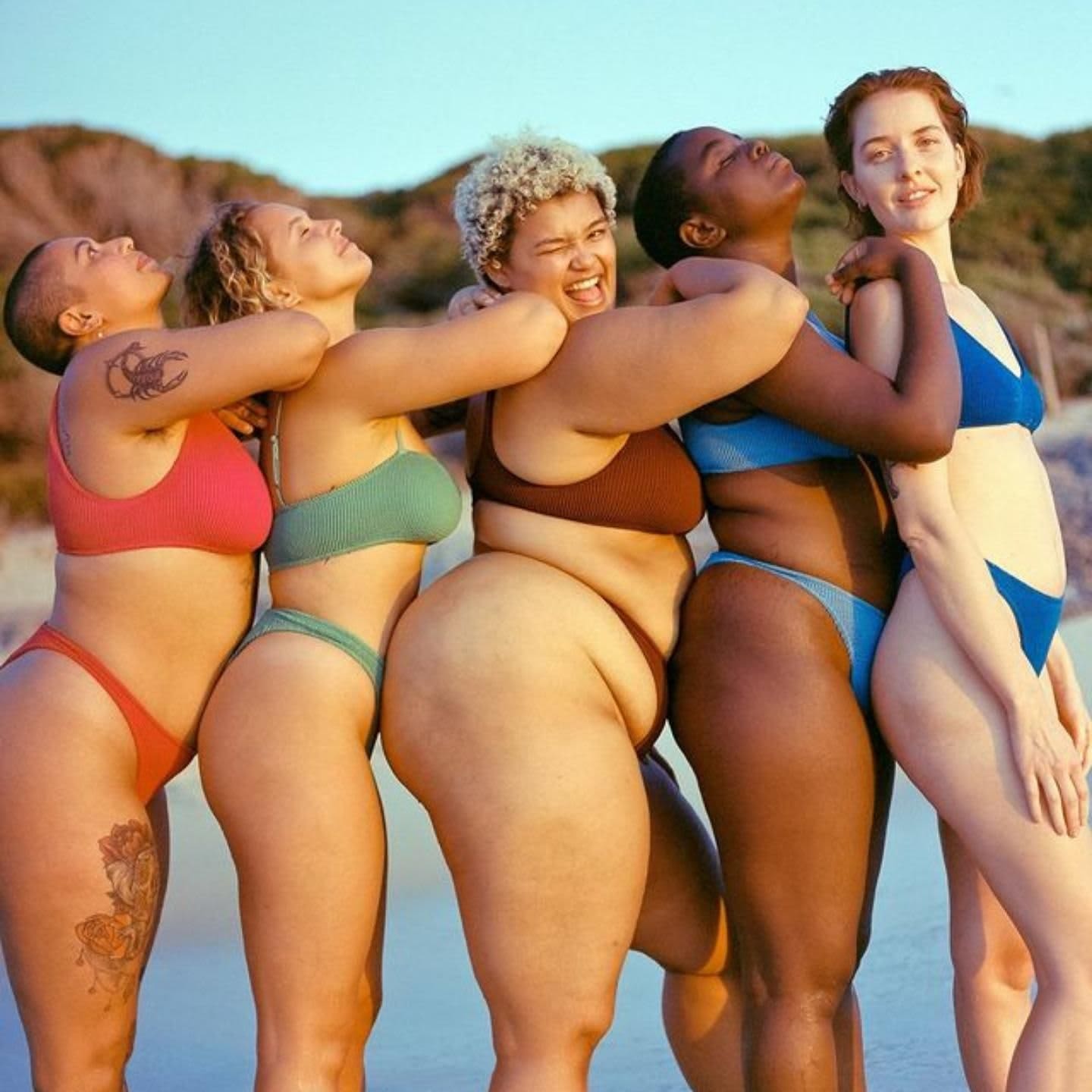Photo of 5 women in bikini on the beach