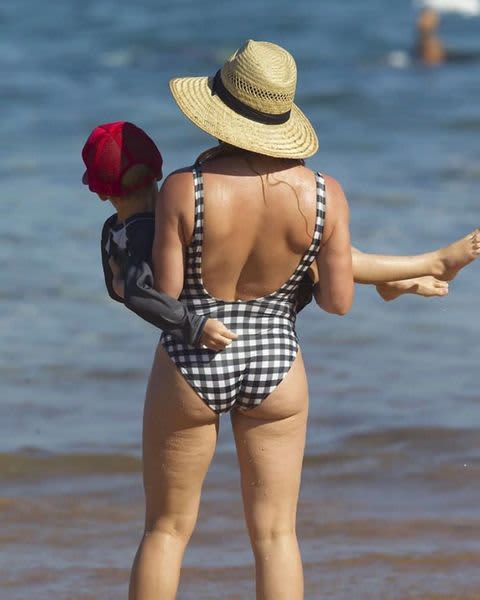 Hilary Duff in one piece swimsuit