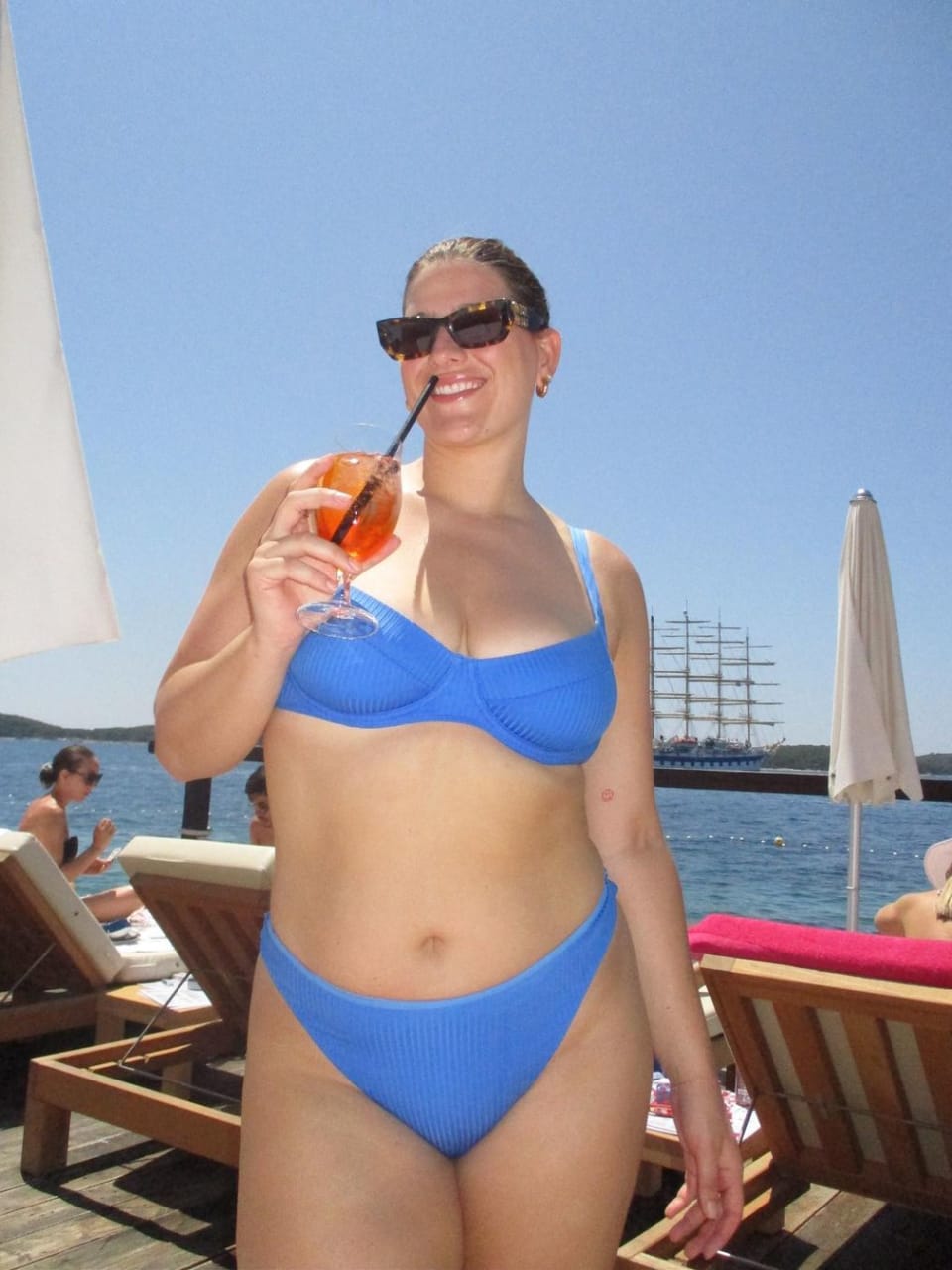 Raeann Langas wearing a sky blue bikini by Monday Swimwear