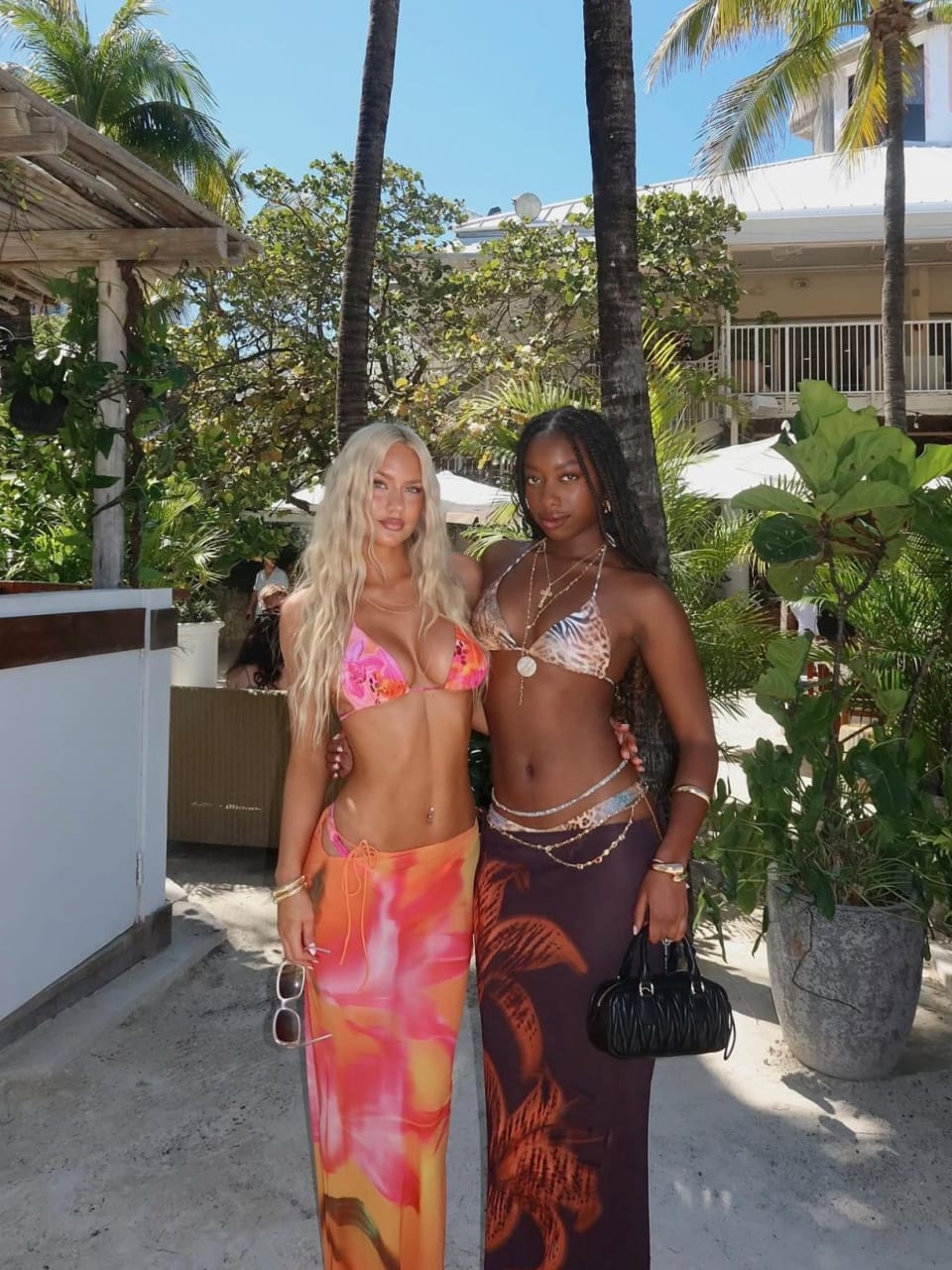 2 models wearing White Fox swimwear at Nikki Beach Miami