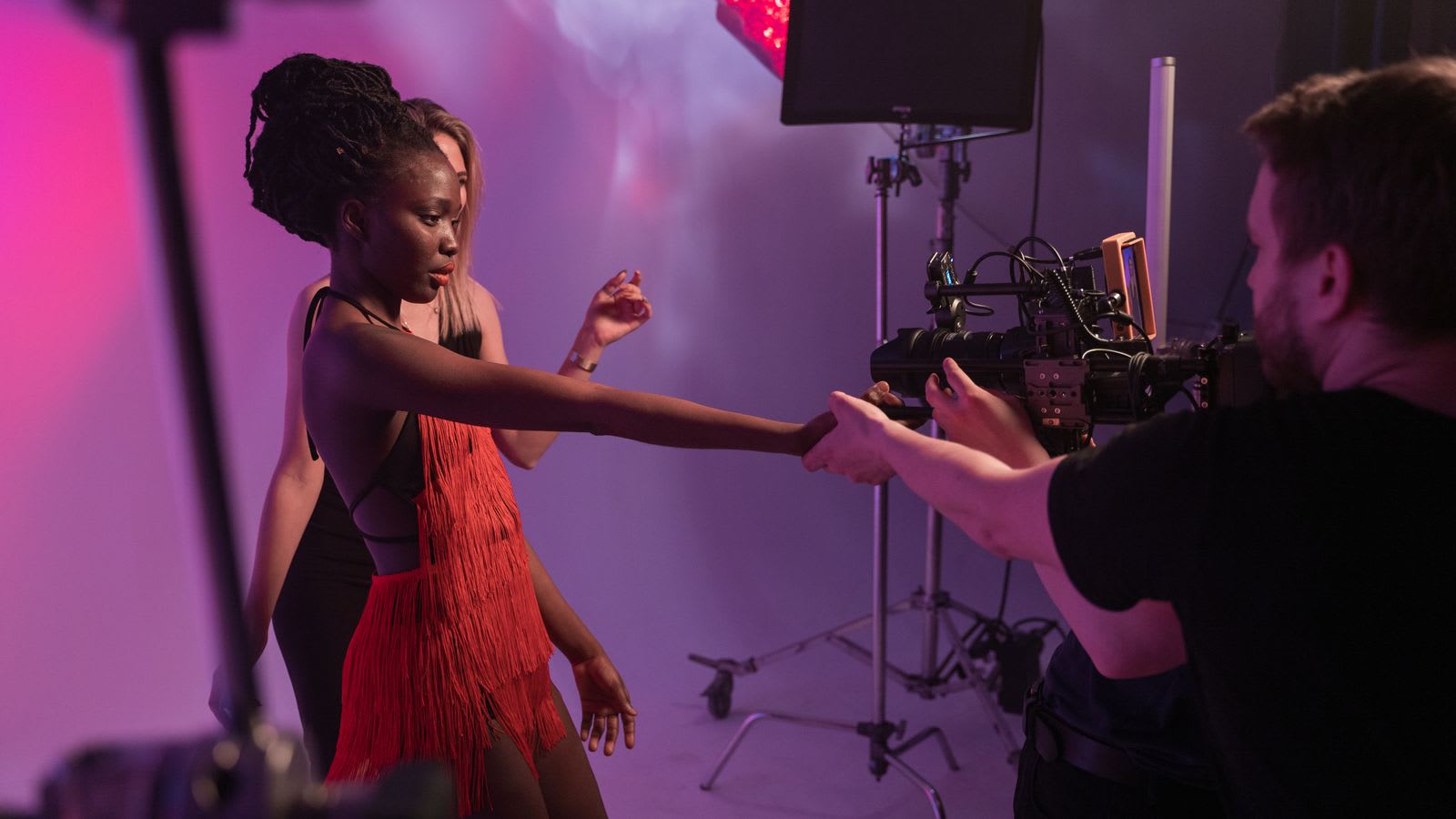 A studio shoot with models and photographers at work