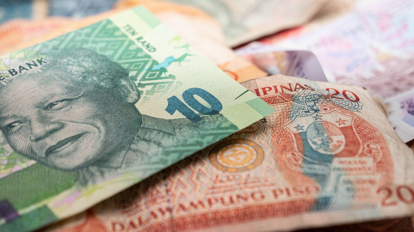 Banknotes from several African currencies laid out
