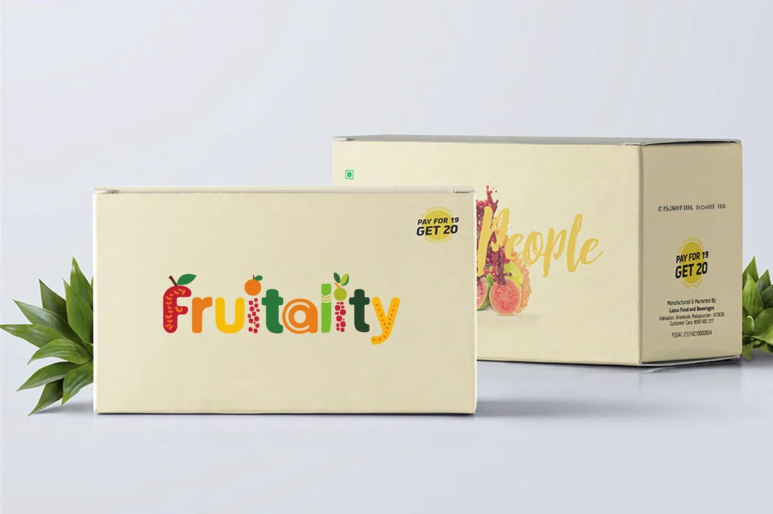 Two cream Fruitality gift boxes showing the wordmark on the front and a coupon panel on the side, beside pineapple leaves