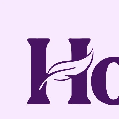 Close-up of the HomeSofy H, with a soft feather-like stroke sweeping through it