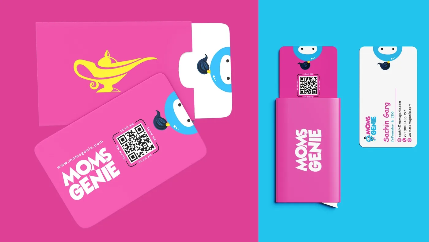 MomsGenie stationery: a pink envelope with a yellow lamp, QR cards, a card sleeve and business cards with Wishie peeking in