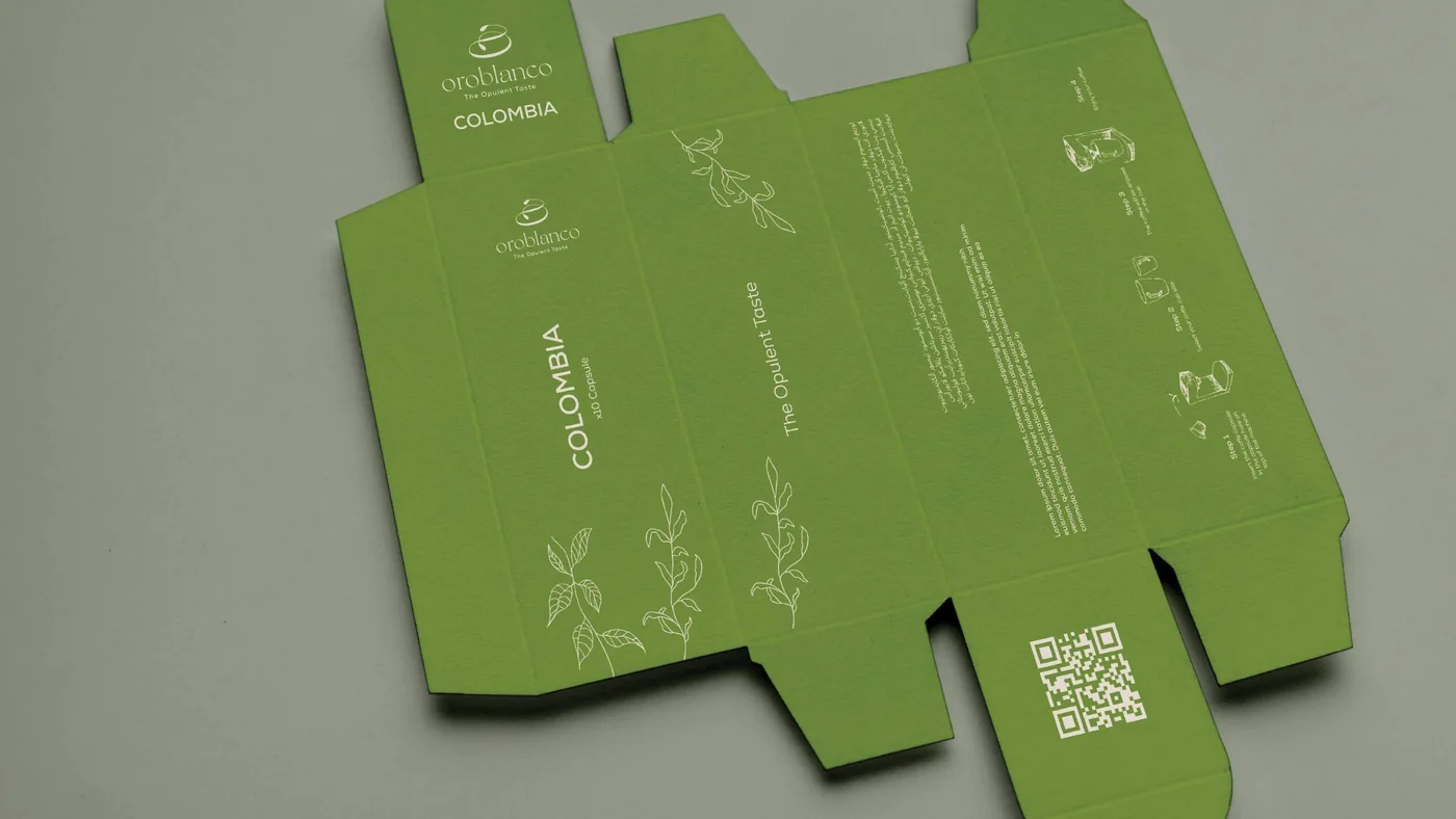 An Oroblanco box dieline laid flat in solid green, with white line drawings and the logo
