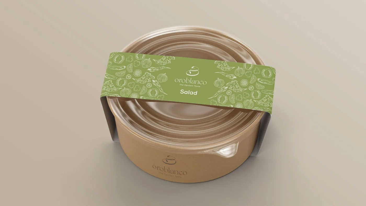 An Oroblanco salad bowl wrapped in a green band of line drawings with the logo