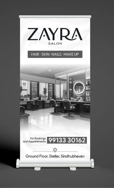 A ZAYRA Salon roll-up standee: the name, hair, skin, nails and make-up, a photo of the salon, a bookings number and the address