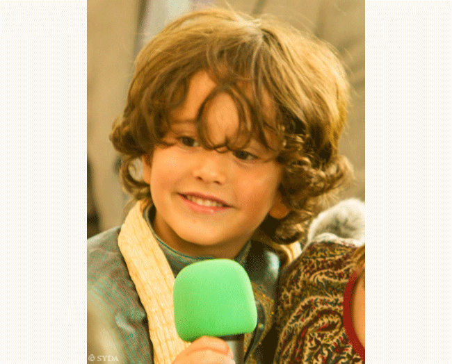 lttle boy on mic