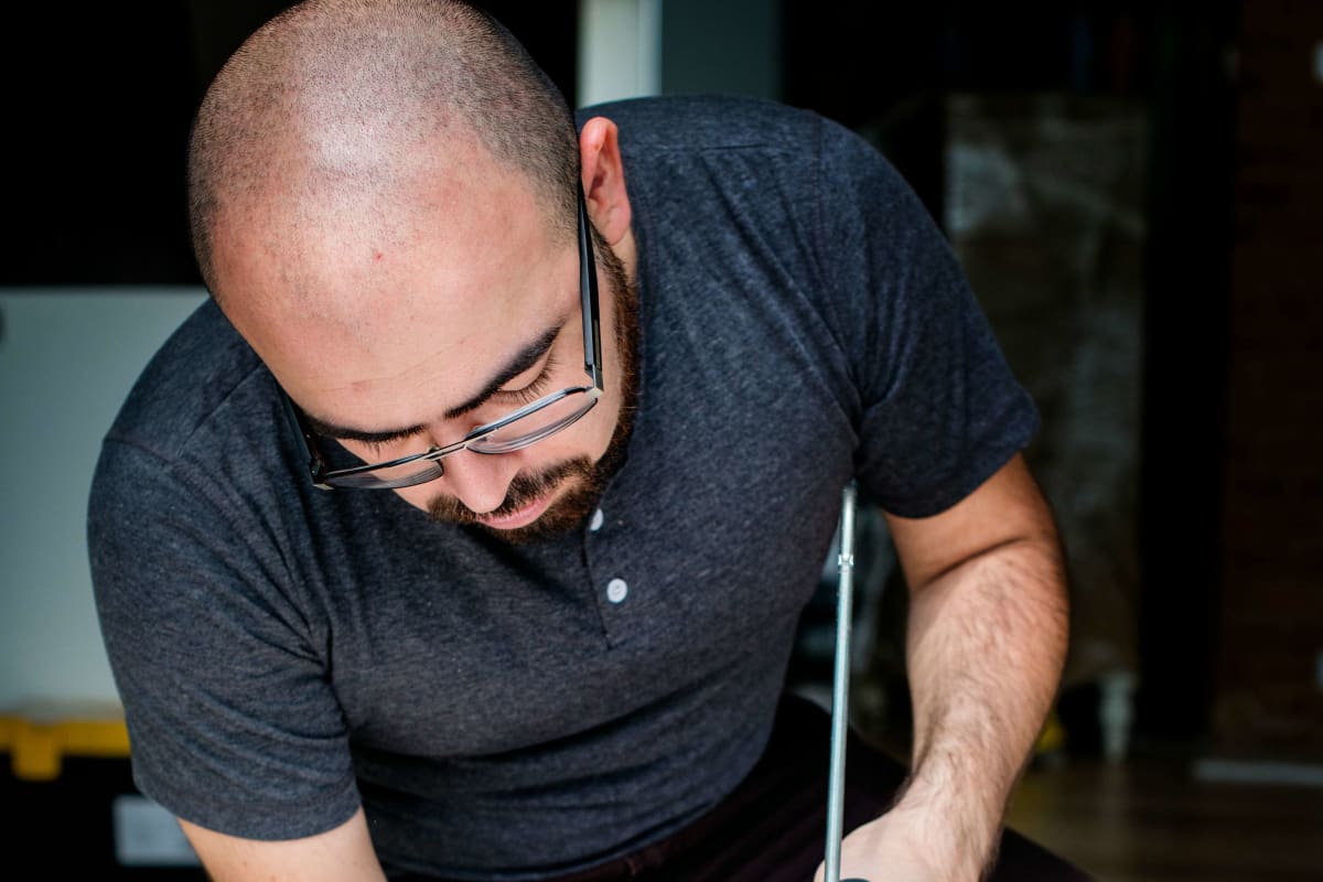 Running a bead of caulk with a caulk gun