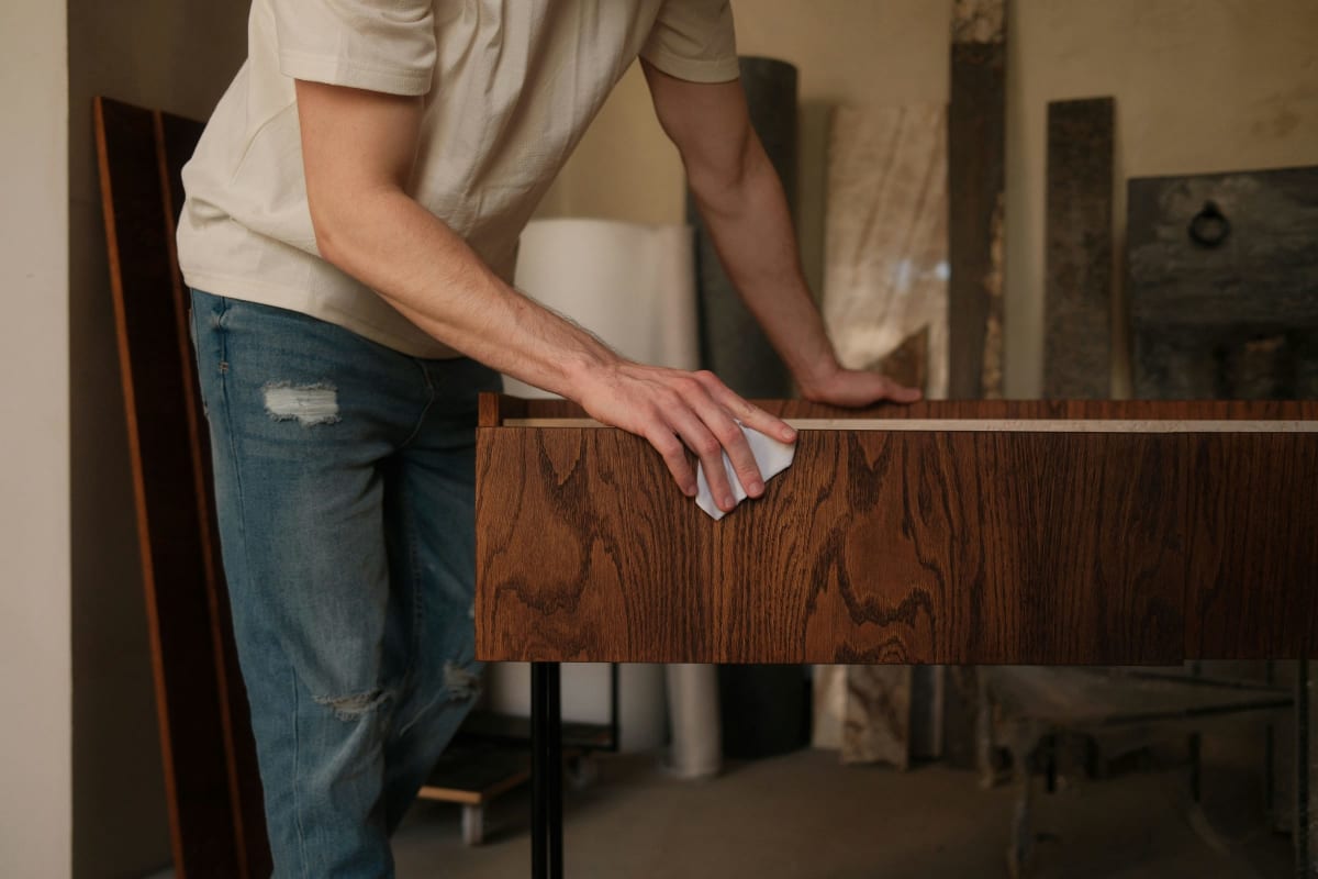 Wiping a finish onto a wood cabinet