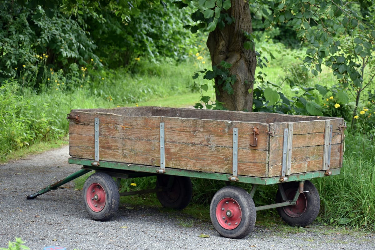Wood yard cart on a garden path