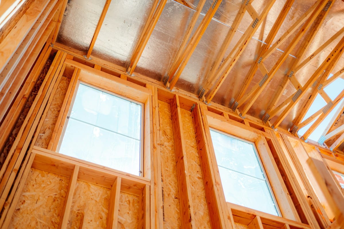 Framed walls with window openings and sheathing