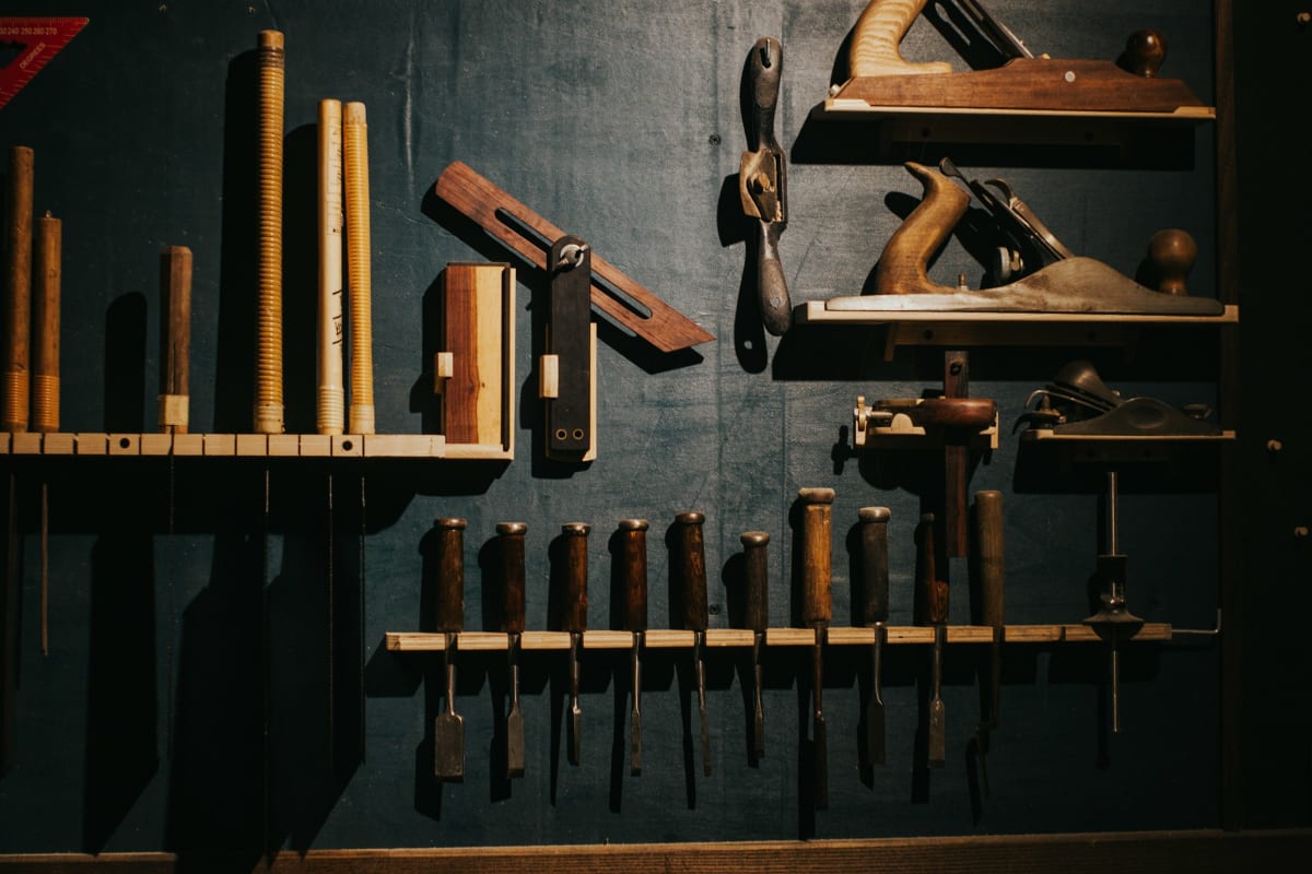 Chisels and planes on a shop wall