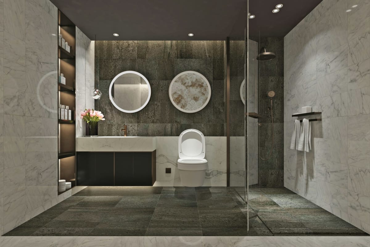 Modern bathroom with a glass shower and stone walls