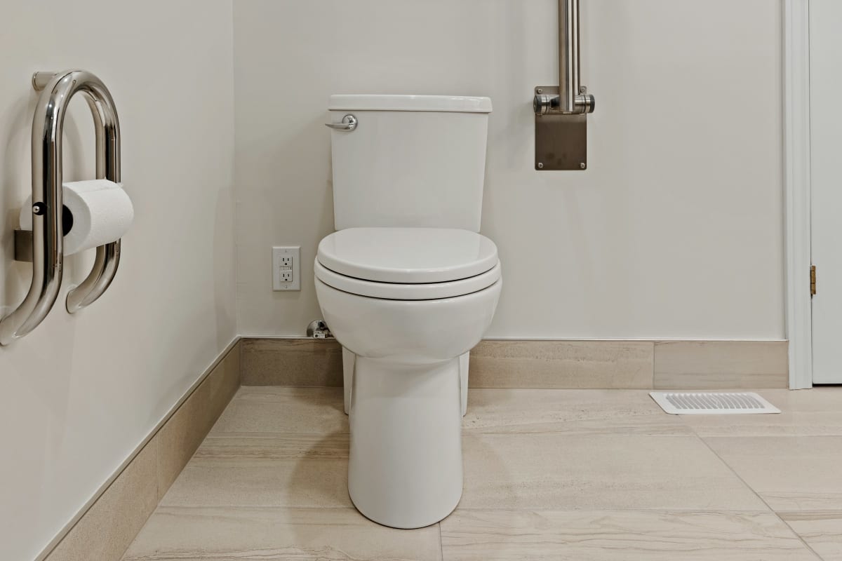 Clean toilet in a bright bathroom