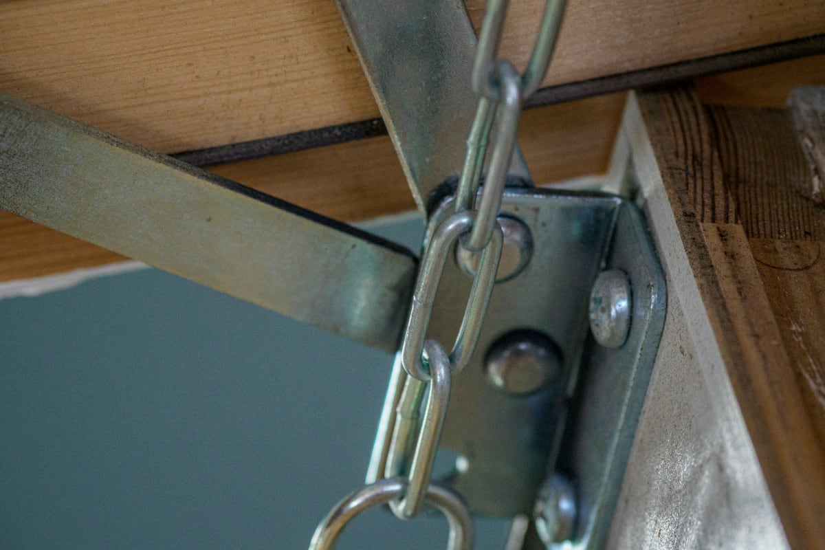 Steel hardware bolted to a beam