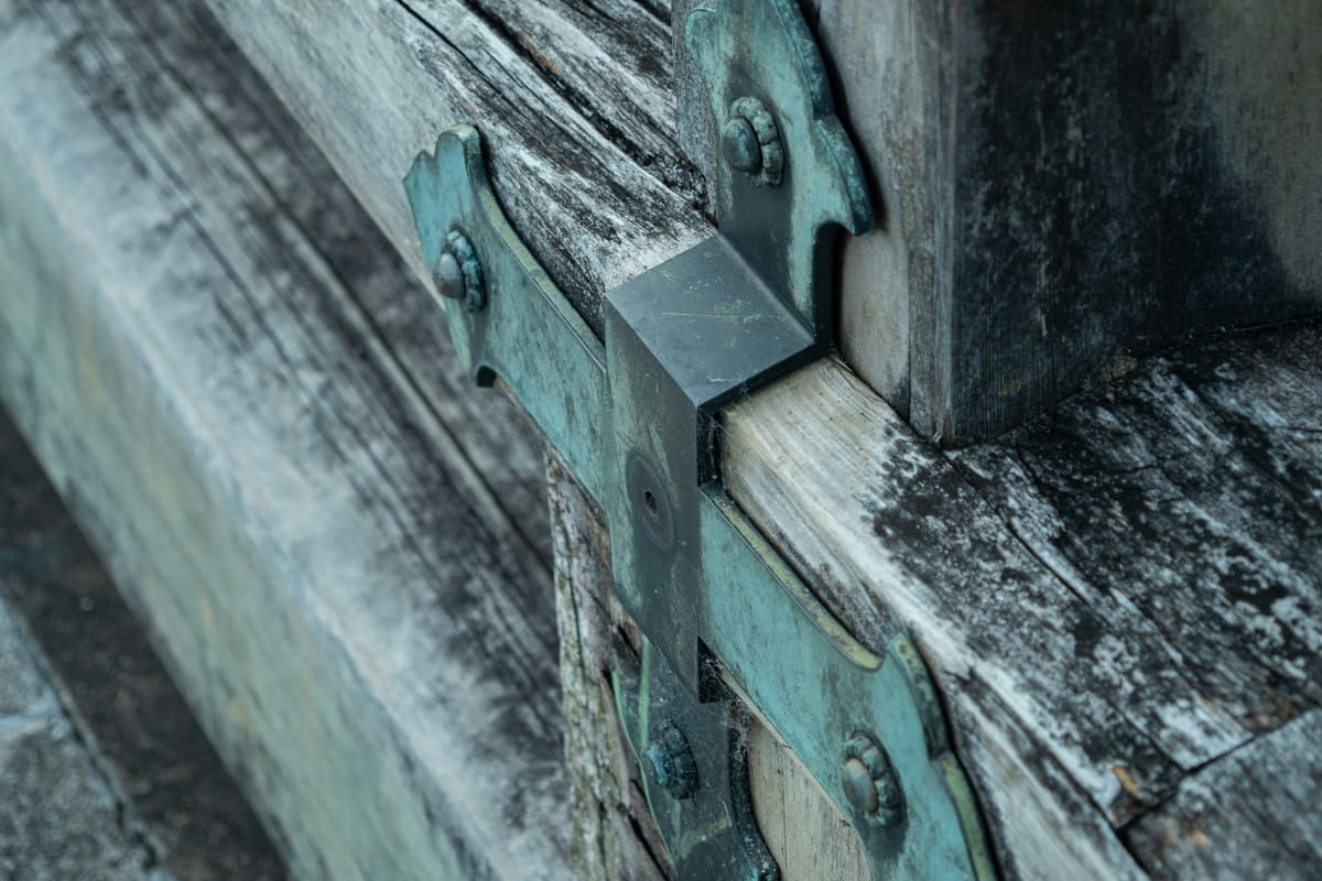 Metal connector on heavy timber