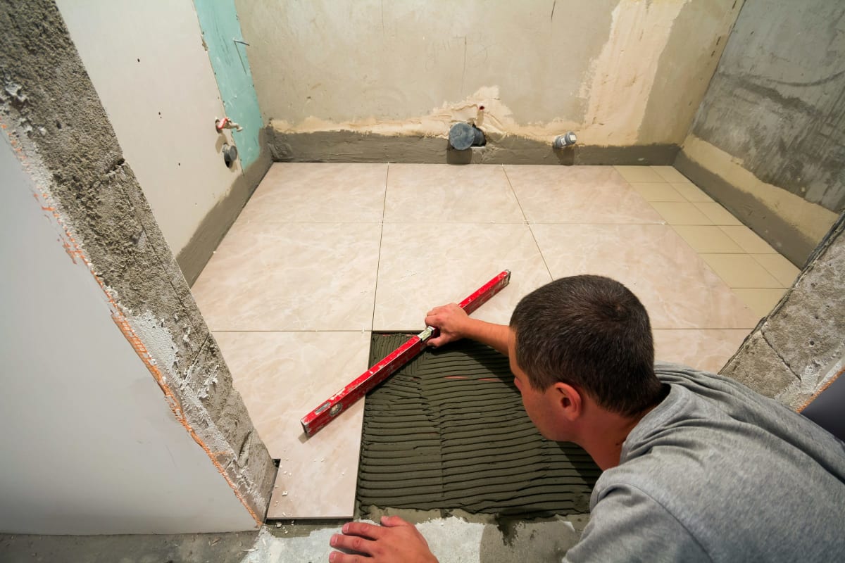 Leveling tile on a bathroom floor