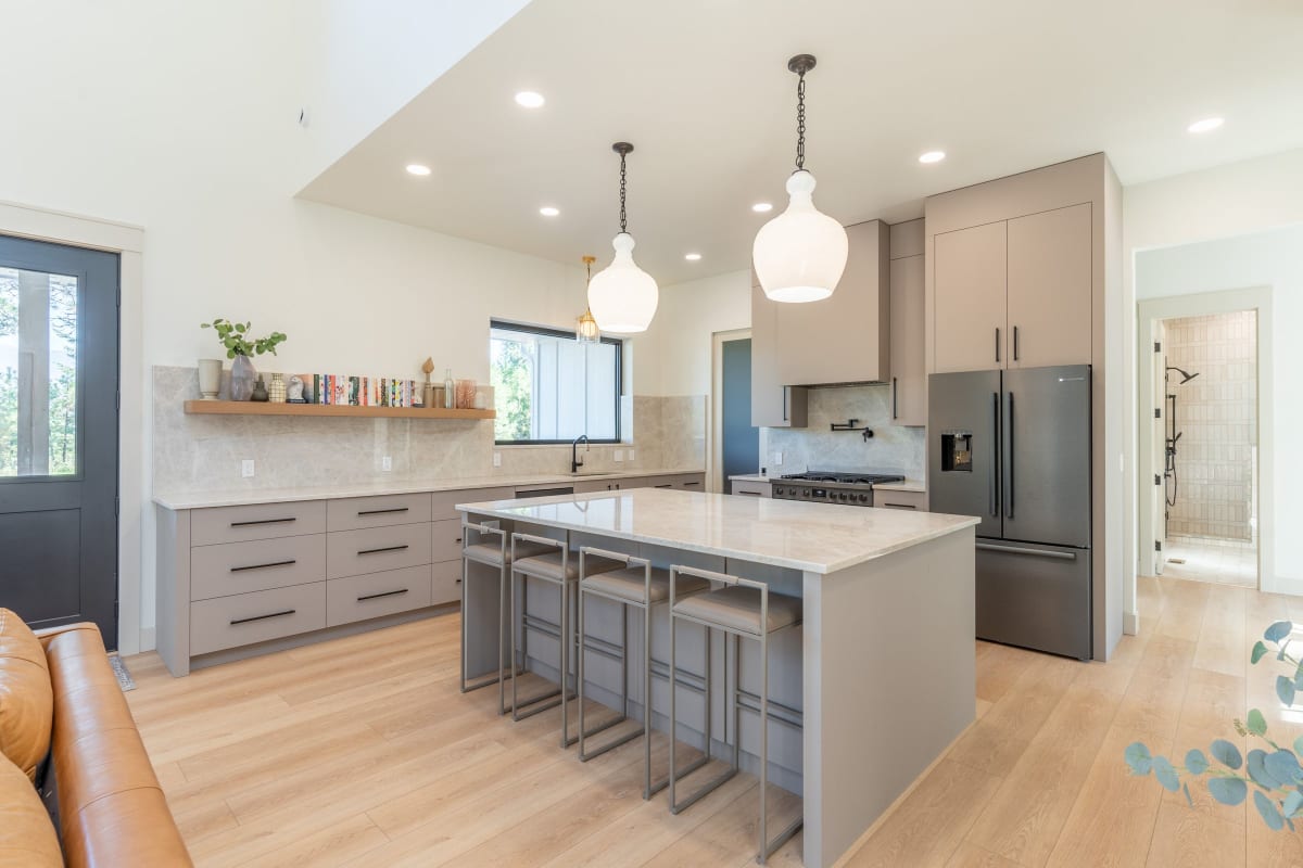 Kitchen with gray cabinets and a big island