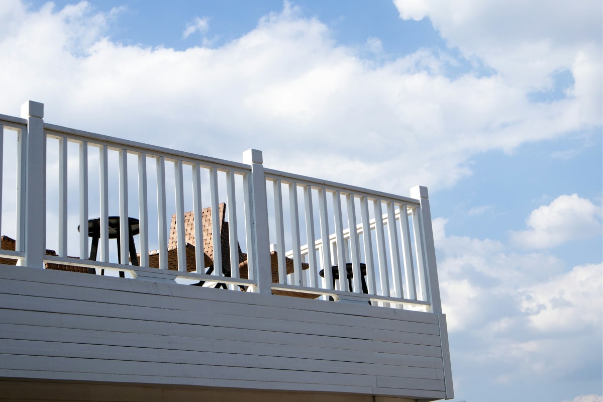 White railing on a deck