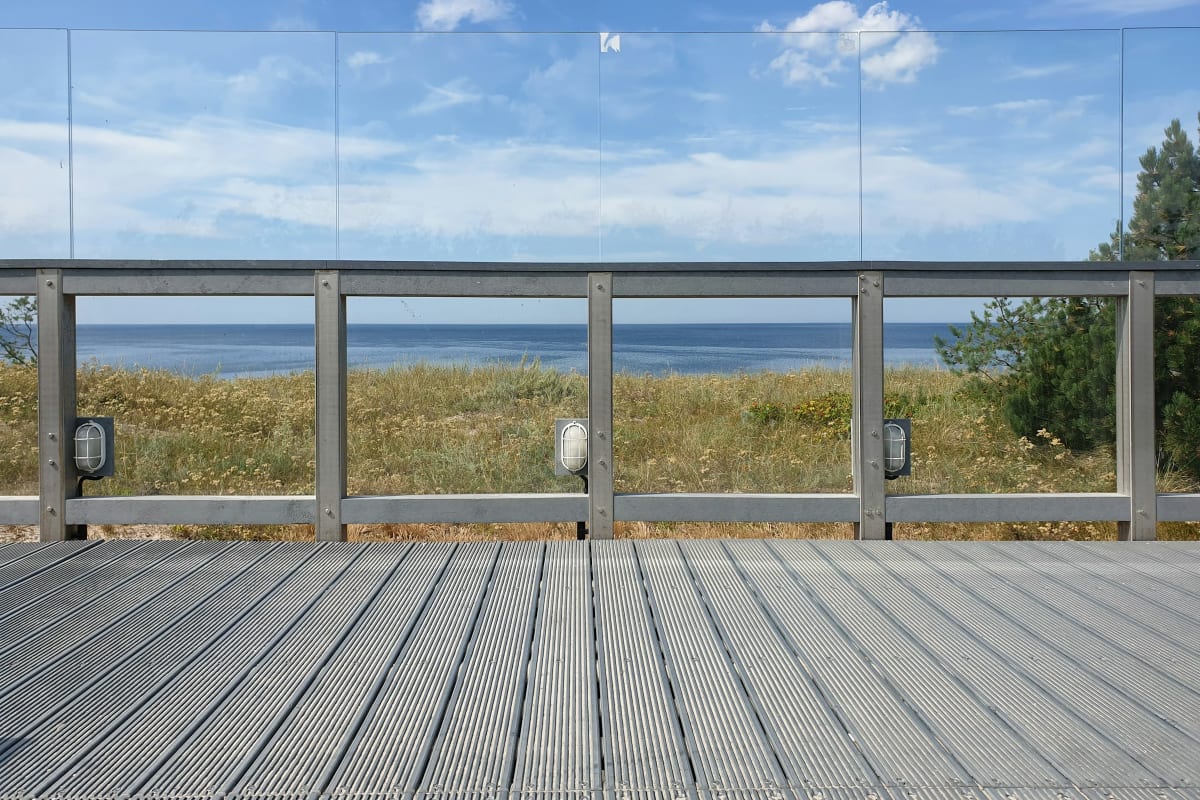 Deck with aluminum railing overlooking the water